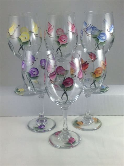 These surfaces can be painted the hall color. A set of 6 hand painted wine glasses, each with a ...