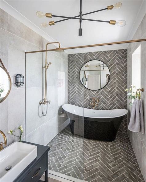 Extravagant Master Bathroom Complete With Freestanding Tub And Herringbone Til 2019