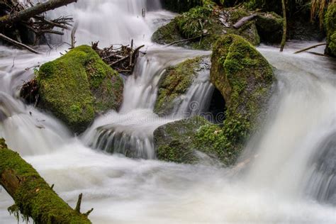 Gertelbach Waterfall In The Black Forest With Mossy Stones And Orange