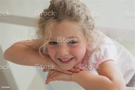 Closeup Portrait Of A Cute Smiling Girl Stock Photo Download Image