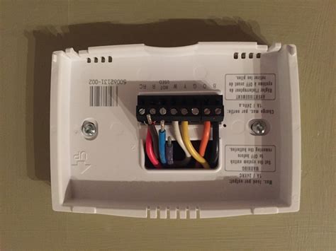 The problem may not be your thermostat at all; HONEYWELL Thermostat Wiring - HVAC - DIY Chatroom Home Improvement Forum