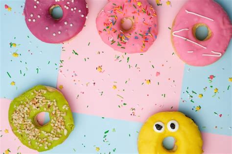 Premium Photo Whole Round Pink Donuts With Colored Sprinkles