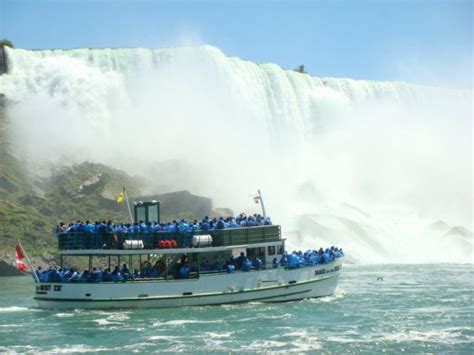 A view of the maid of the mist passing in front of the american falls. Things to do in Niagara Falls Canada | Niagara Falls ...