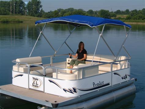 One Of Our Stealth Electric Pontoon Boats With A Torqeedo Motor