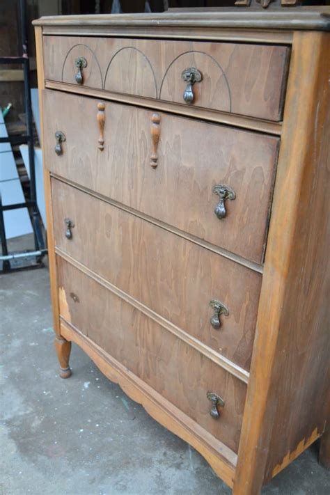 Think twice before you lug that old dresser to the dump. DIY Painted Gray Dresser Makeover That Is Easy To Do