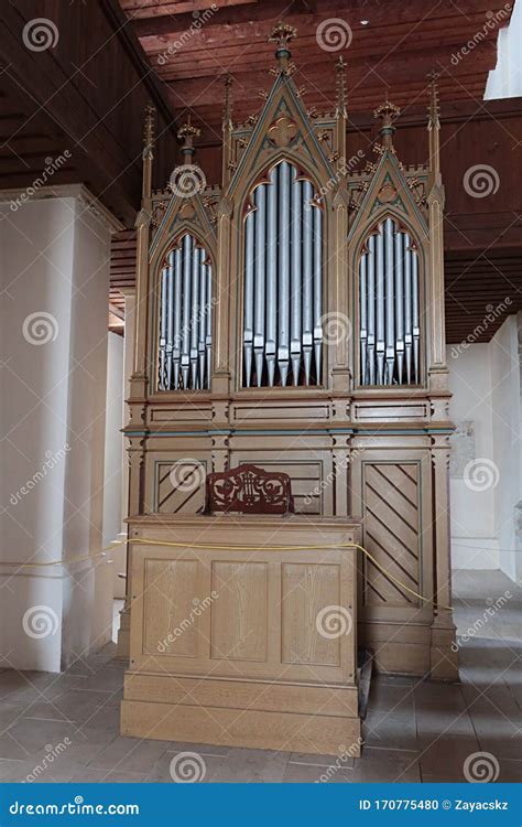 Small Compact Gothic Church Organ With Three Pipe Sections Installed In