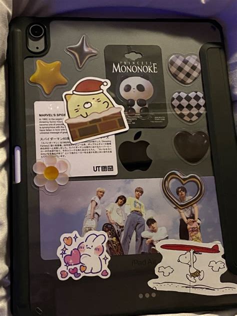 An Ipad Case With Stickers On It