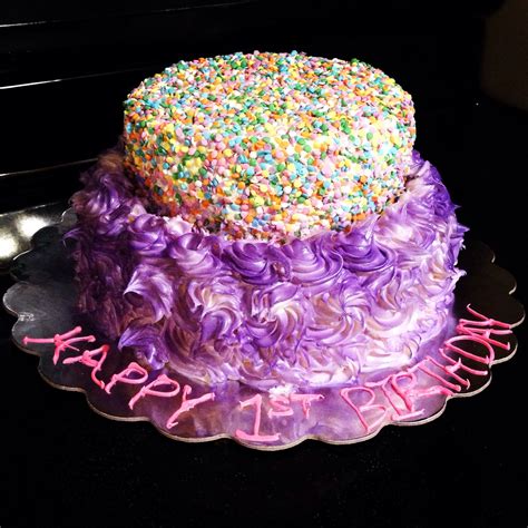 This is similar, but slightly different. 2 tier 1st birthday cake. Blue velvet and red velvet ...