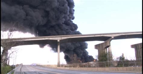 Massive Warehouse Fire Sends Thick Column Of Black Smoke