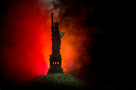 Silhouette Statue Of Liberty On Dark Toned Foggy Background Statue Of
