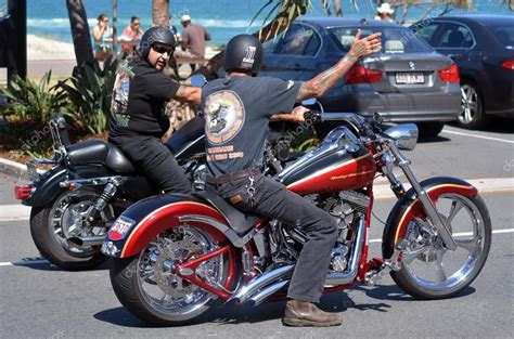 Men Ride Harley Davidson Motorcycle In City Street Stock Editorial