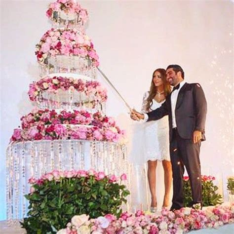 One wedding tradition in lebanon is for the bride and groom to join hand in hand to cut the wedding cake with a long sword. Beautiful wedding cake by photographer : Brightlightimage -Wedding planner : EyeCandy Real weddi ...
