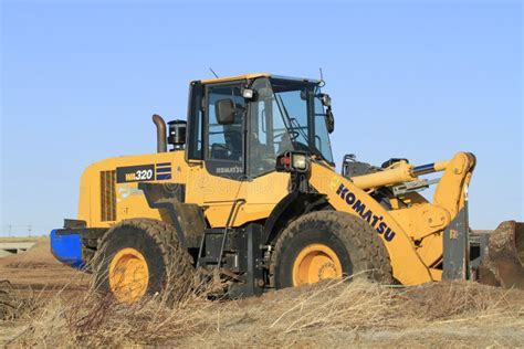 A Komatsu Front End Loader Working On A Highway By Pass In Kansas Out
