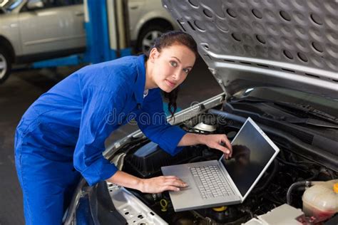 Mechanic Using Laptop On Car Stock Photo Image Of Manual Indoors