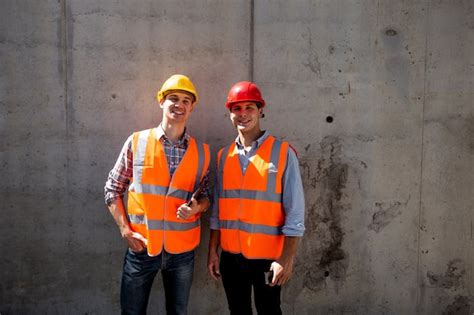 Premium Photo Structural Engineer And Architect Dressed In Orange