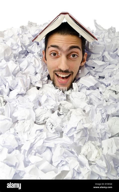 Man With Lots Of Crumpled Paper Stock Photo Alamy
