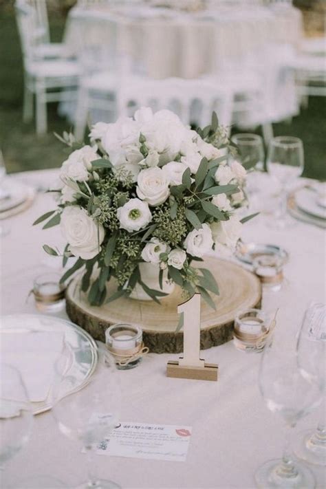15 Budget Friendly Rustic Wedding Centerpieces With Tree Stumps