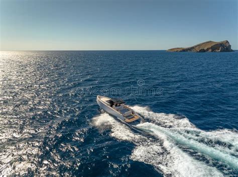 Luxury Motor Boat Moves Through The Ocean At Speed Aerial View Stock