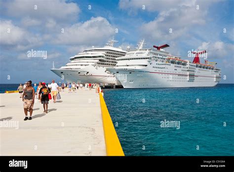 Cruise Ship Passengers On Pier Disembarking From Cruise Ships In Cozumel Mexico In The