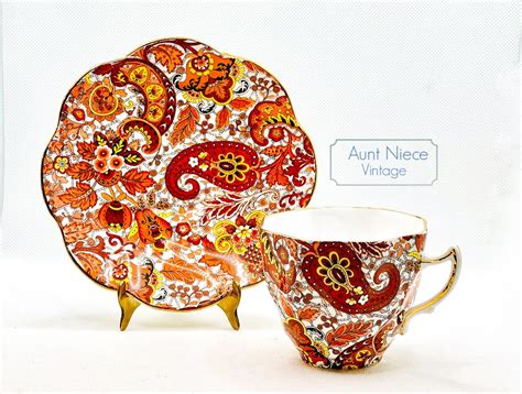Vintage Teacup And Saucer Rosina Red Orange Gold Paisley Chintz Teacup