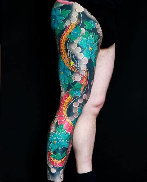 Scary black ink apple snake tattoo design for men. Gorgeous Japanese leg-sleeve by @lucaortis. Snakes ...