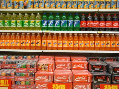 2560x1440 wallpaper | soda products arranged on retail gondola | Peakpx