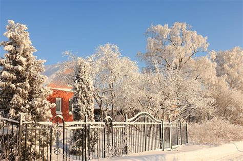 Winter In Russia A Frosty Day After A Snowfall In The Russian Village