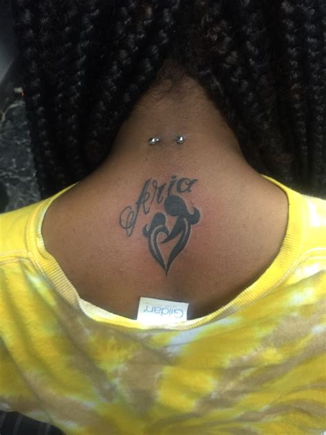 I found it because i've been experiencing back pain so i took a mirror and i discovered the bone sticking out. Back of neck Mother/Daughter tattoo with child's name ...