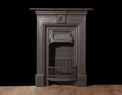 Victorian cast iron fireplace £480.00 code: A small antique cast-iron bedroom fireplace