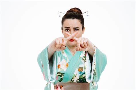 Free Photo Woman In Traditional Japanese Kimono With Serious Face