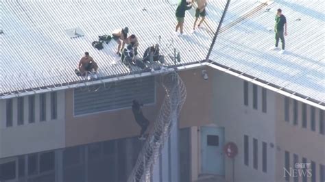 prisoners climb onto australian prison roof ctv news