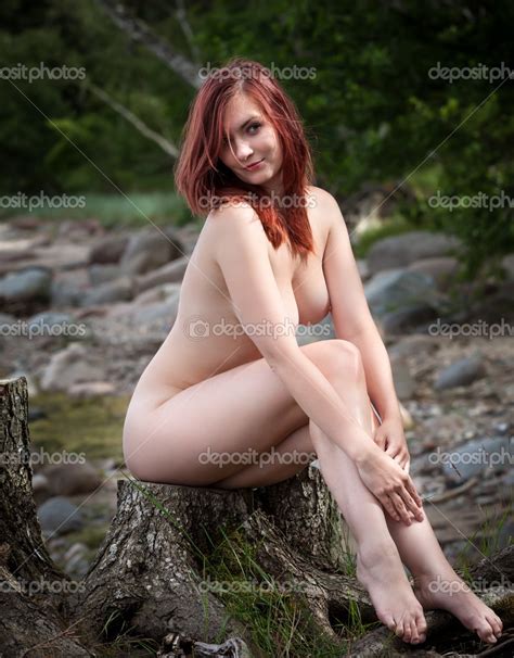 Naked Woman Sitting On A Wooden Stump Stock Photo Palinchak