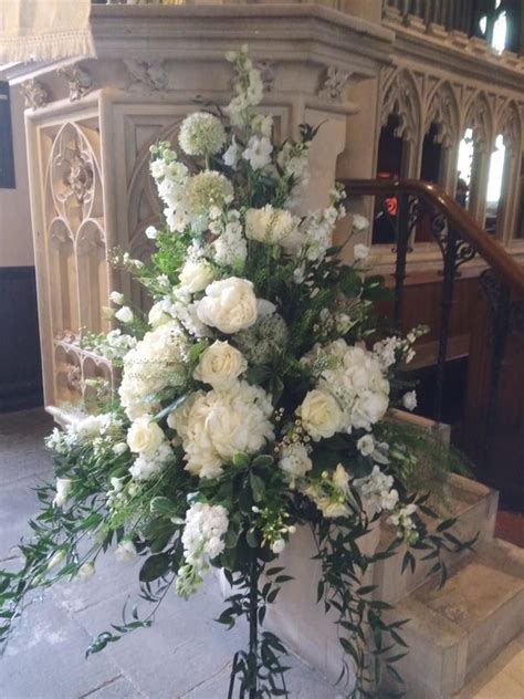 Pedestals In White With Peonies Rose And Stocks Wedding Flowers