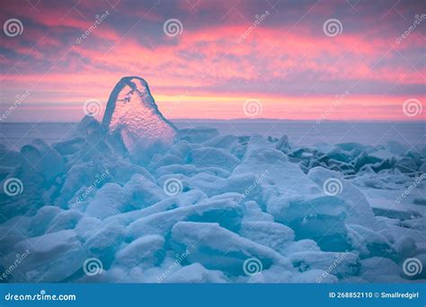 Blue Transparent Ice On Baikal Lake At Sunrise Winter Landscape Stock