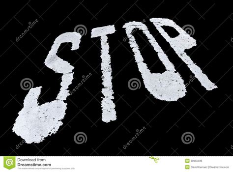 Stop Sign Painted On The Wall Isolated Over Black
