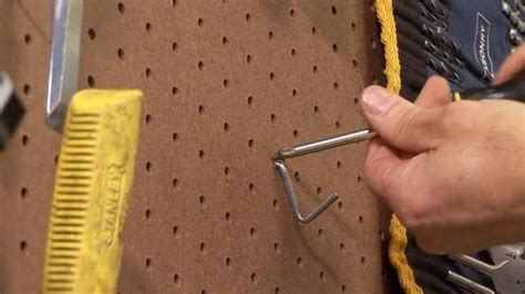 How To Secure Hooks In Pegboard Todays Homeowner Peg Board