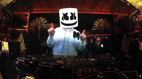 Dj Marshmello With Electronic Music Instrument Showing Hand Sign 4k Hd