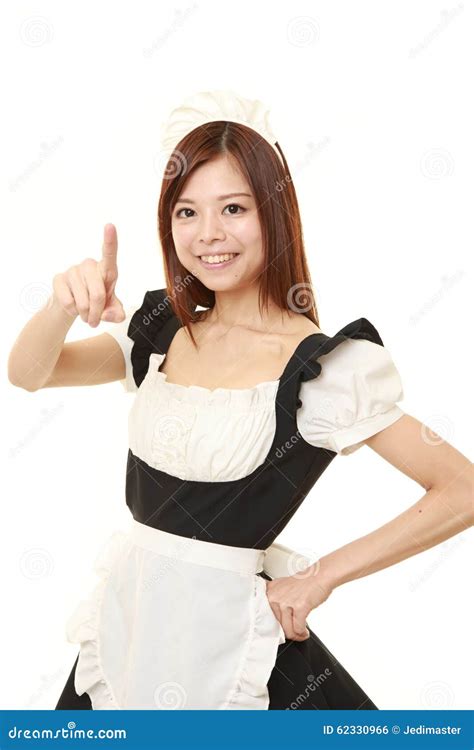 Young Japanese Woman Wearing French Maid Costume Presenting And Showing