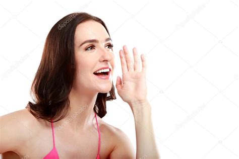 Attractive Woman Yelling With Hand Beside Her Face Stock Photo By ©odua