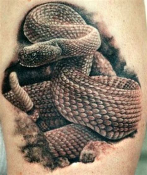 22 Snake Tattoos With Impressive Meanings Tattooswin Snake Tattoo
