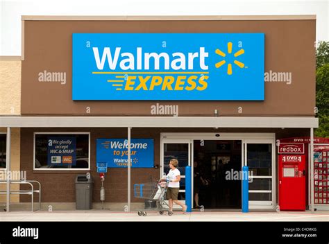 A Customer Exits A Walmart Express Store In Gentry Arkansas Usa