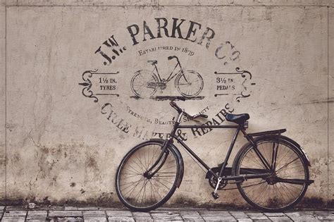 A Bicycle Parked Against A Wall With The Words I M Parker Co Painted On It