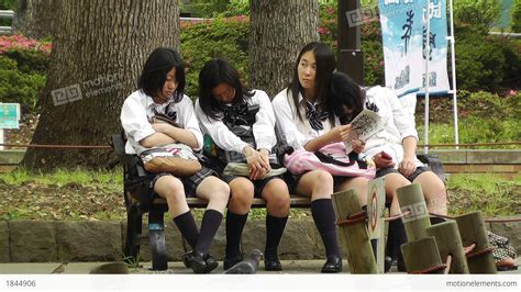Japanese Schoolgirls Relaxing In Park In Yokohama Japan 11 Stock Video 1844906