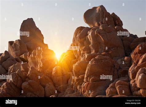 Sun Shining Through Rock Formations Stock Photo Alamy