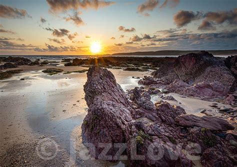 Sunset On Scenic Rocky Beach In Freshwater West South Wales Uk