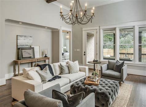 Monochromatic color schemes are guaranteed to suit each other because they all come from the same family. Repose Gray in a monochromatic living room by Domaine Development. Photography by Garrett Buel ...