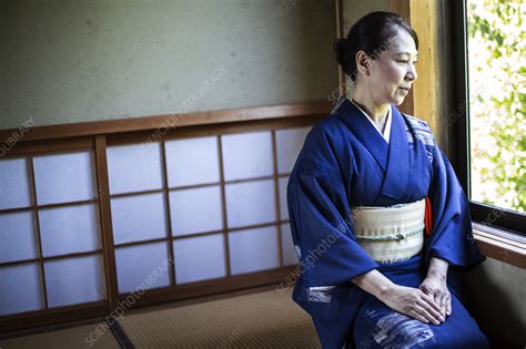 japanese woman in blue kimono and cream coloured obi stock image f024 0009 science photo