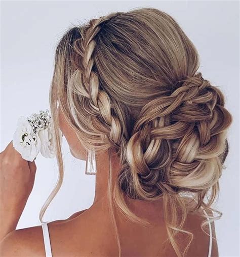 25 Updo Wedding Hairstyles For Long Hair We Love An Ethereal Romantic Updo More Than Just