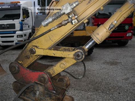 Cat dealer services help you operate longer with lower costs. CAT 307 B 2001 Caterpillar digger Construction Equipment ...