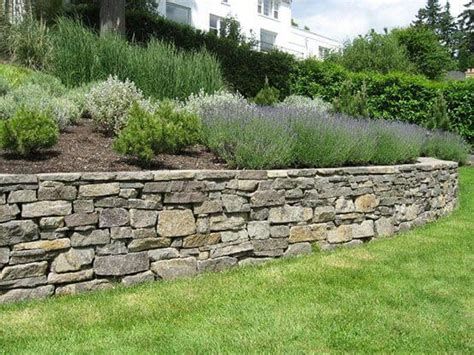 Building A Stone Retaining Wall Jcs Landscaping
